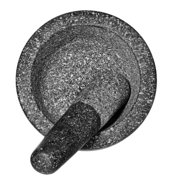 istock Granite mortar with pestle. Empty crushing dish, isolated on a white background. 951477924
