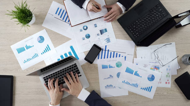 istock Analysts studying opinion poll statistics, preparing election campaign strategy 951481440