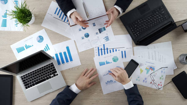 istock Proactive sales manager making good offer to client, fingers walking on table 951483520