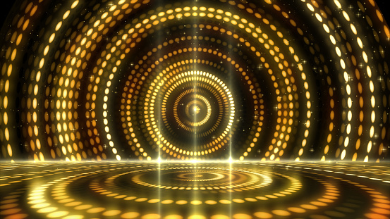 Futuristic abstract glittering moving golden and elegance lights pattern for stage performance show and video jockey  background and screensaver