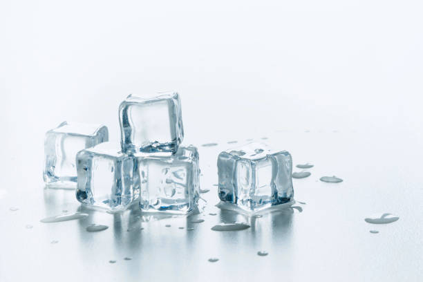 Freshness ice cubes isolated on white. Close up.
