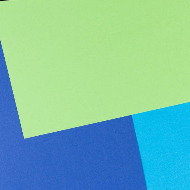 istock Color papers geometry flat composition background with yellow, green, white and blue tones 951491900