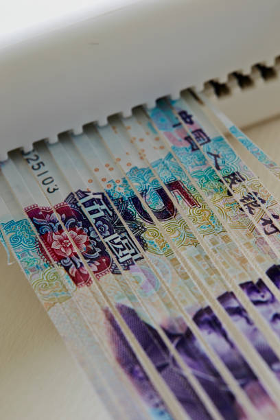 istock Shredded Chinese paper currency 951492076