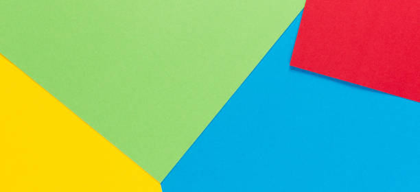 istock Color papers geometry flat composition background with yellow, green, red and blue tones 951492080