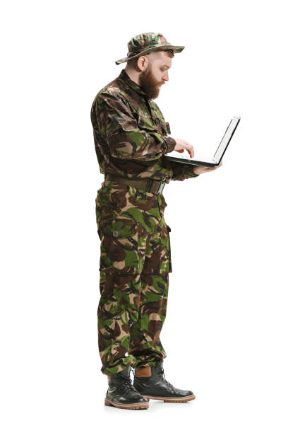 istock Young army soldier wearing camouflage uniform isolated on white 951494932