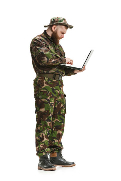 istock Young army soldier wearing camouflage uniform isolated on white 951494998