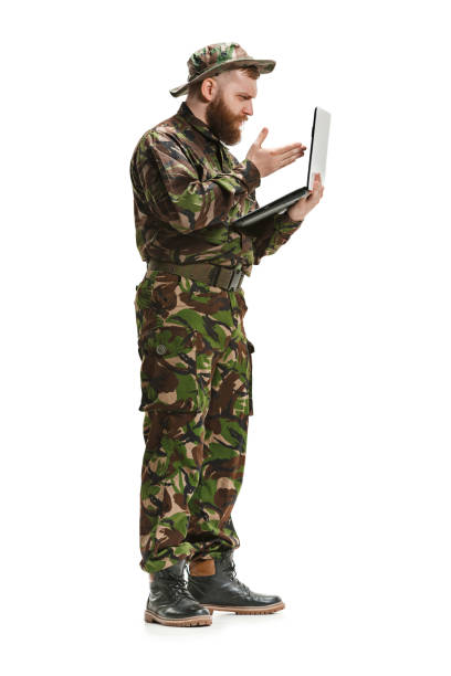 istock Young army soldier wearing camouflage uniform isolated on white 951495184