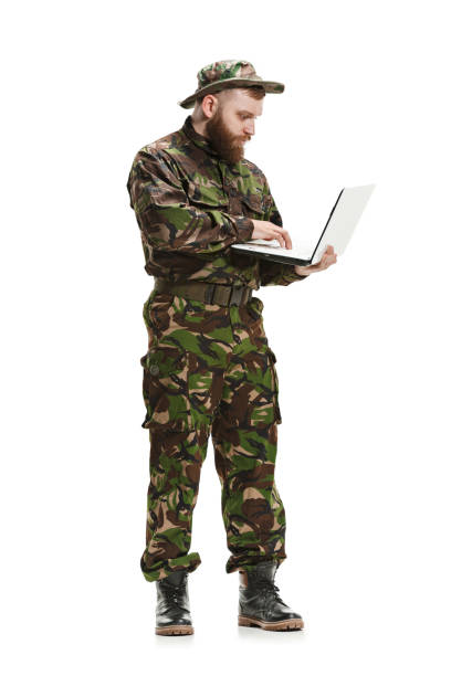 istock Young army soldier wearing camouflage uniform isolated on white 951496048