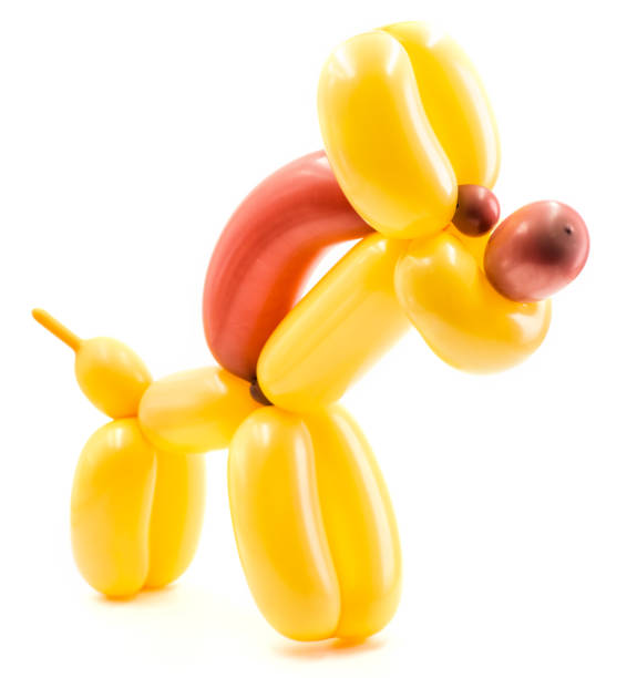 istock orange and brown twisted balloon horse isolated on white 951496066