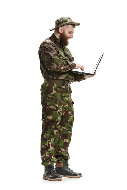 istock Young army soldier wearing camouflage uniform isolated on white 951496122