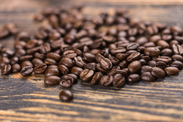 istock Coffee on grunge wooden background 951499534