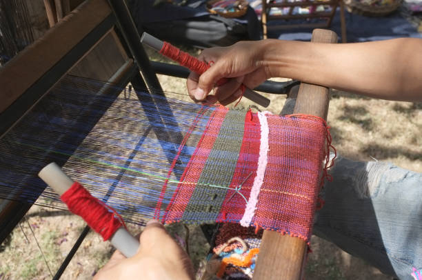 istock The man weaving traditional thai fabric, 951499912