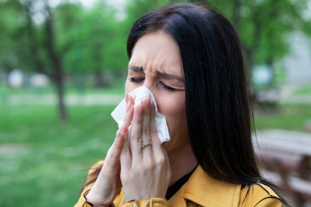istock Girl blowing nose 951500840