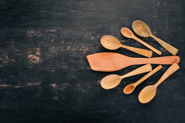 istock Kitchen Wooden Tools. Top view. On a wooden background. Copy space. 951508068