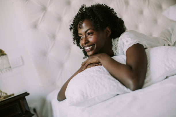 istock Young black woman in bed 951524592