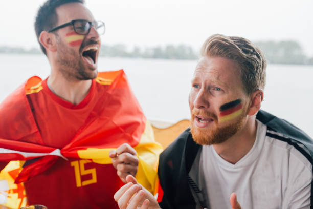 istock Spanish and German national soccer team supporters shouting 951525088