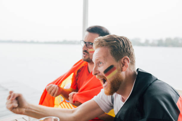 istock German soccer enthusiast shouting in excitement 951525222