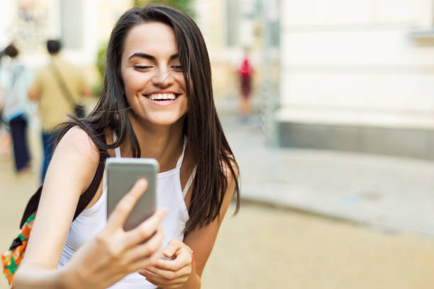 istock Pretty woman using phone 951525578