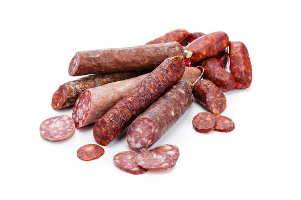 istock Mixed spanish chorizo heap isolated on white background 951539316