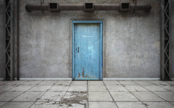istock Dark concrete walls room with old door 951539836