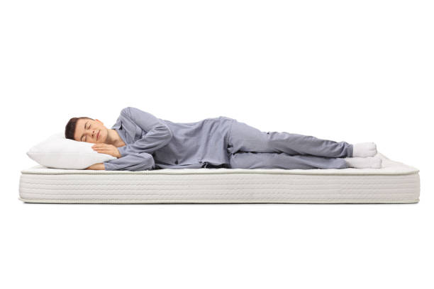istock Teenager sleeping on a mattress 951541874