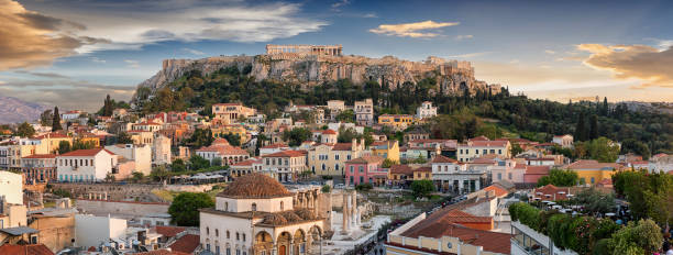 Panoramic view over the old town of Athens and the Parthenon Temple of the Acropolis Panoramic view over the old town of Athens and the Parthenon Temple of the Acropolis during sunset plaka athens stock pictures, royalty-free photos & images