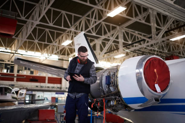 istock Aircraft mechanic in the hangar 951616804