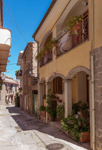 istock typical small italian street on sardinia 951630456