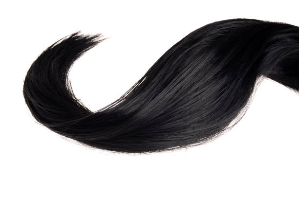 piece of black hair in a wave isolated piece of black hair in a wave isolated on white black hair stock pictures, royalty-free photos & images