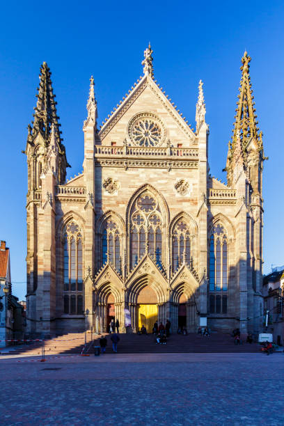Gothic architectural structure against a blue sky in Alsace vertical