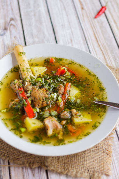 istock Soup with lamb and vegetables in a ceramic plate 951634208