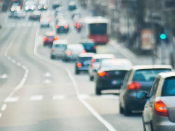 istock Traffic jam on urban street blurry image 951634332