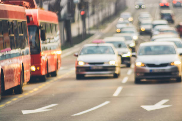 istock Traffic jam on urban street blurry image 951634386