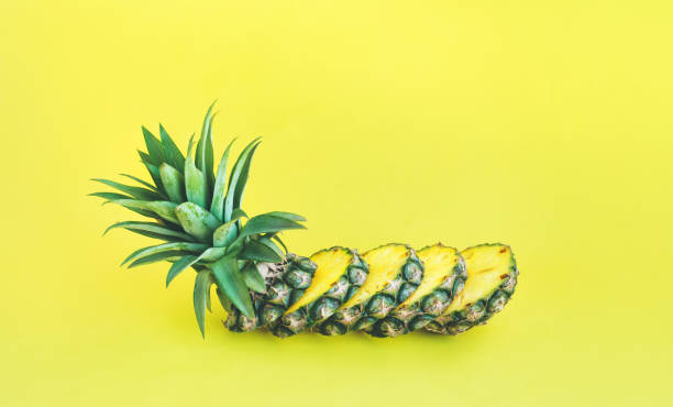 istock Pineapple slice on pastel color background.fruit refreshment and summer concept 951640584