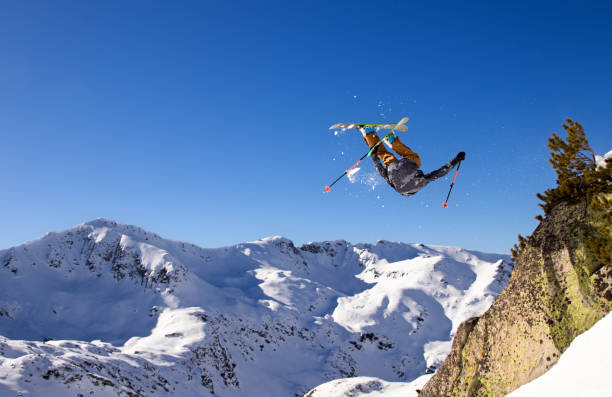 istock Young ski athlete backflipping off a rock 951641204