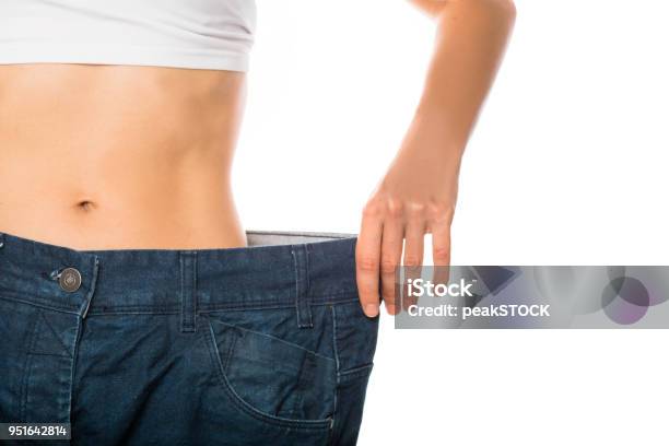 Weight Loss And Slimming Stock Photo - Download Image Now - Dieting, Exercising, One Woman Only
