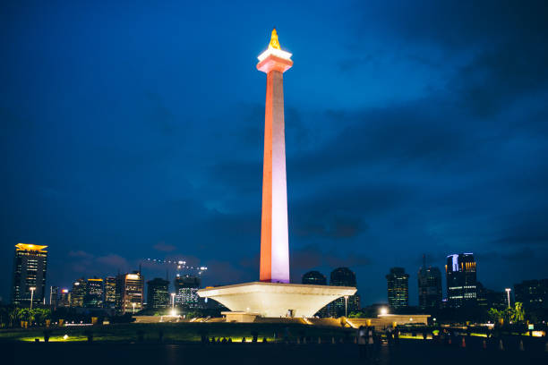 Jakarta is a city in Indonesia. Independence Monument in the Park Jakarta is a city in Indonesia. Independence Monument in the Park, in the Center of the City merdeka square stock pictures, royalty-free photos & images