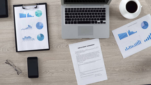 istock Employment agreement on workplace waiting for being signing by boss, top view 951645872