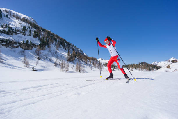 istock cross country skiing man skating on sunny winters day 951647476