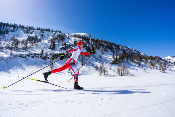 istock classic style cross country skiing man on sunny winters day 951647664