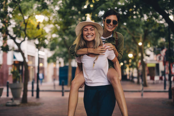 istock Beautiful friends having fun outdoors 951652300