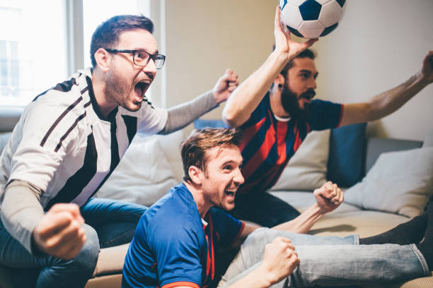 istock Male football supporters shouting 951652548