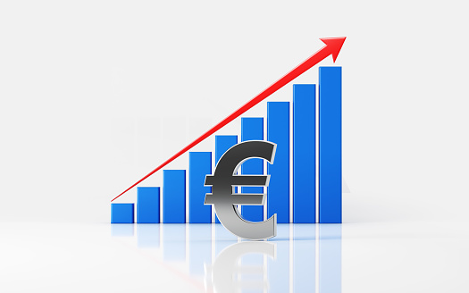 Blue financial growth bar and a red arrow with a Euro symbol on white reflective surface. Growth concept. Horizontal composition with selective focus and copy space. Clipping path is included.