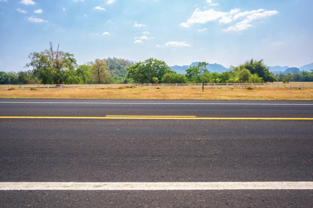 Asphalt road and countryside views.