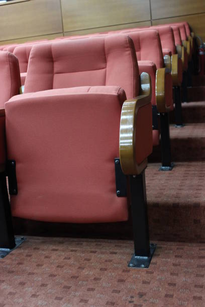 istock Theater pink seats 951654600