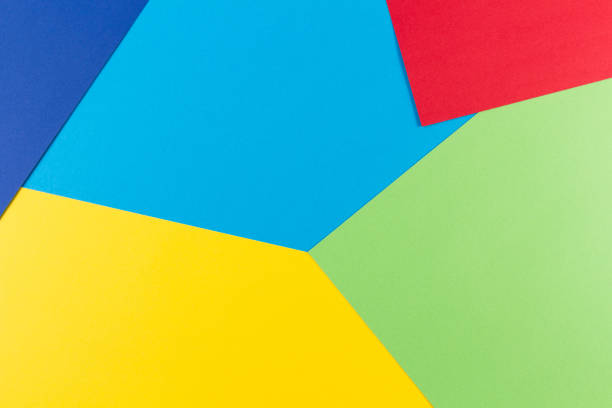 istock Color papers geometry flat composition background with yellow, green, red and blue tones 951655934