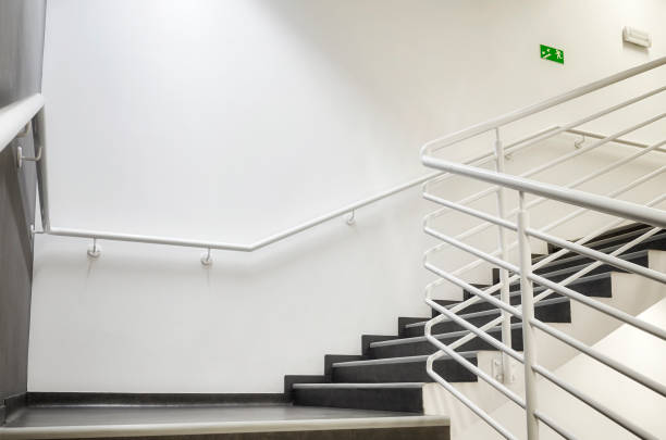 Modern empty staircase with white wall. stock photo