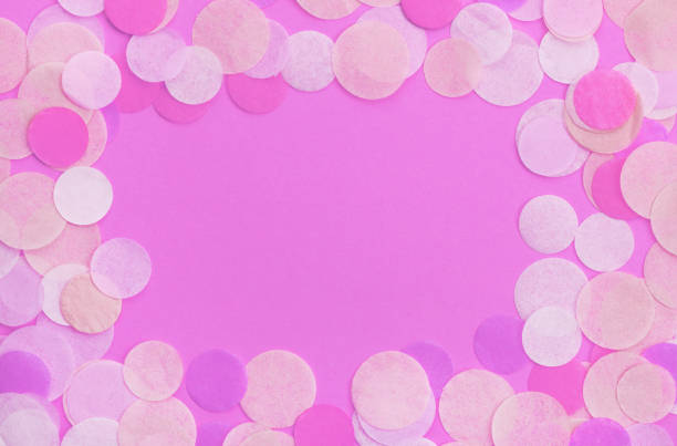 istock Pink confetti on pastel Ultra Violet background. Festive background  for your design. 951656490