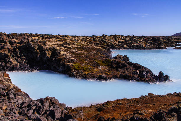 istock Rocky coast and crater pool in Iceland. Blue Lagoon 951657744