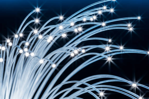 istock Bundle of optical fibers with lights in the ends. 951658252